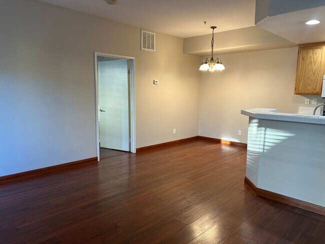 Building Photo - Great 2-bedroom 2 bath condo with A/C, 1 car garage and additional