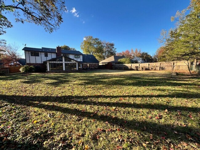 Building Photo - Step into this inviting, sunlit home where space and comfort blend seamlessly