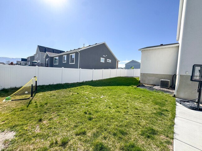 Building Photo - Modern 4 Bed / 3 Bath Home in Syracuse | Bonus Room + Fenced Yard + 86” TV Included