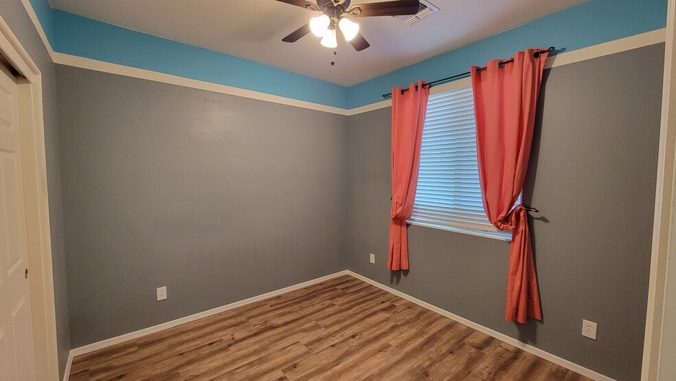 Bedroom 2 - this room has been repainted to beige to match the hallway. Photo will be updated soon - 3907 S Vineyard Ave