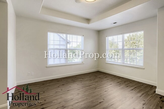 Building Photo - Charming 3-Bedroom Home with Wood Floors, Gas Fireplace & Private Patio