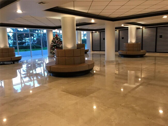 Building Photo - 5005 Collins Ave