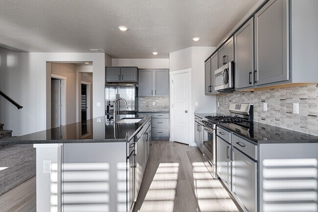 Building Photo - Custom Hunter-Douglas shutters throughout.