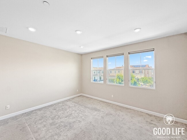 Building Photo - Bright 3BD/2.5BA Townhouse in Vista with Community Pool, In-Unit Laundry & 2-Car Garage