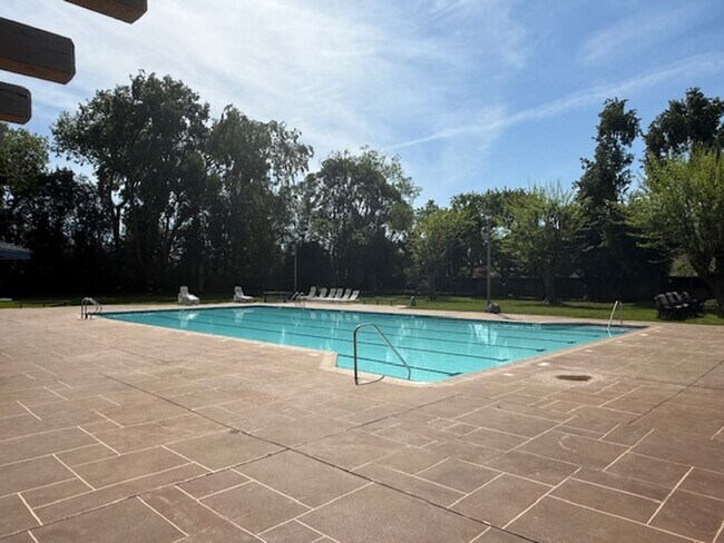 Building Photo - Stunning 5-Bed. 2.5 bath Home in the Heart of Pleasanton Meadows, Community Pool