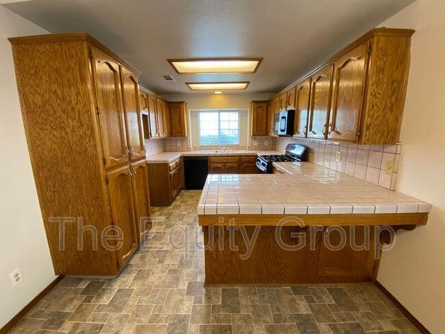 Building Photo - 5817 W Crowley Ave