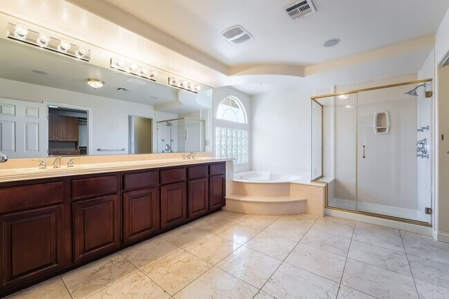 Building Photo - Beautiful Three Story, Five Bedroom Home with Lagoon Style Pool and Spa