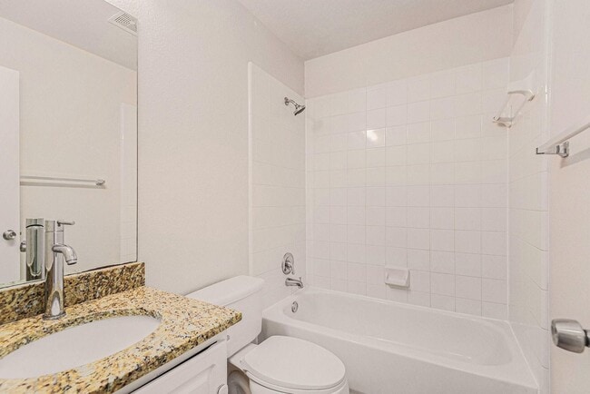 Building Photo - Discover your new home in this spacious 3-bedroom, 2-bath duplex located in the charming city of ...