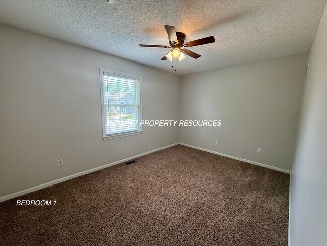 Building Photo - 2421 NE Carousel Cir