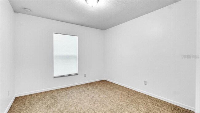 Building Photo - 5999 Village Cir S