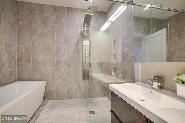 Master bathroom/wet room with dual vanity, free standing tub and shower. - 2207 Flagler Pl NW