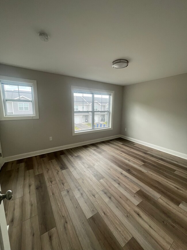 Building Photo - Marion Gardens Townhomes - New Baldwinsville Development