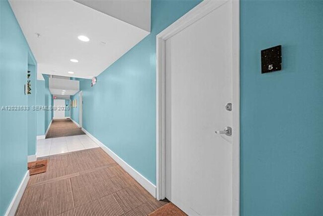 Building Photo - 7728 Collins Ave