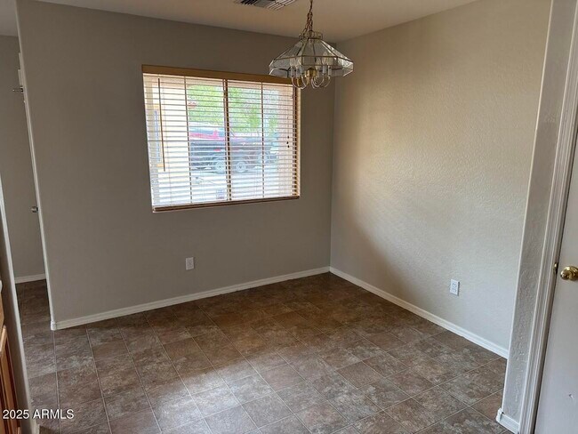 Building Photo - 3110 S 100th Ln