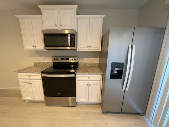 Building Photo - 959 Madrid Court- The Townhomes at Chukker...