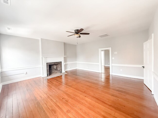 Building Photo - Renovated One-Bedroom Gem Steps from Train...