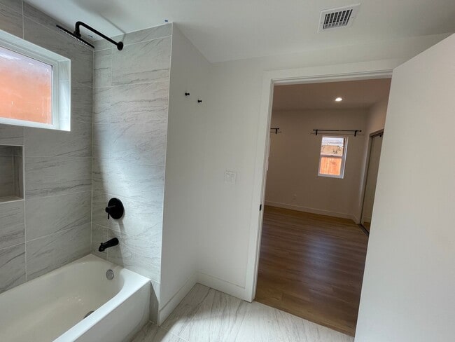 Building Photo - JUST COMPLETED MODERN TOWNHOMES! Never Lived In!