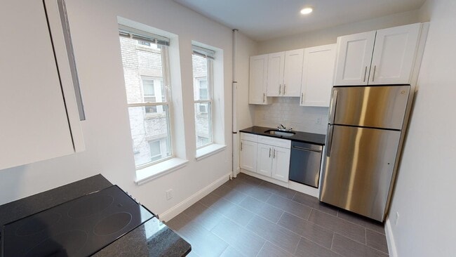 Building Photo - 9/1 No Fee! Renovated, spacious 2BR w/balcony near B/C/D trains