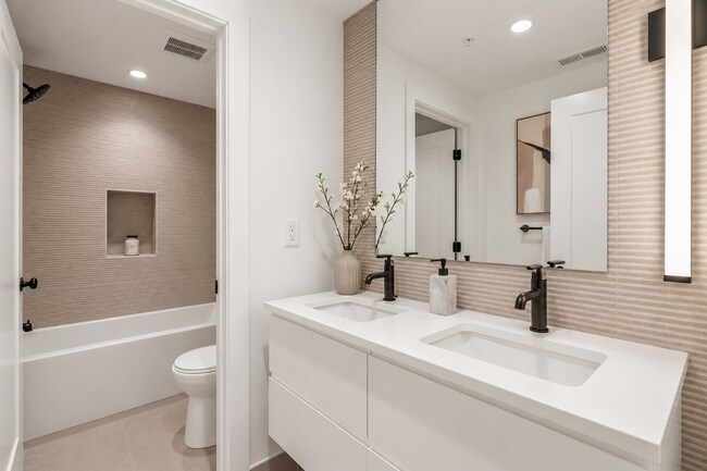 Building Photo - Garage parking, private outdoor space, and skyline views—this Northern Liberties home checks ever...
