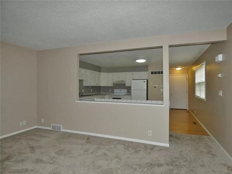 Living Room looking into Kitchen - 77 Brook Cir