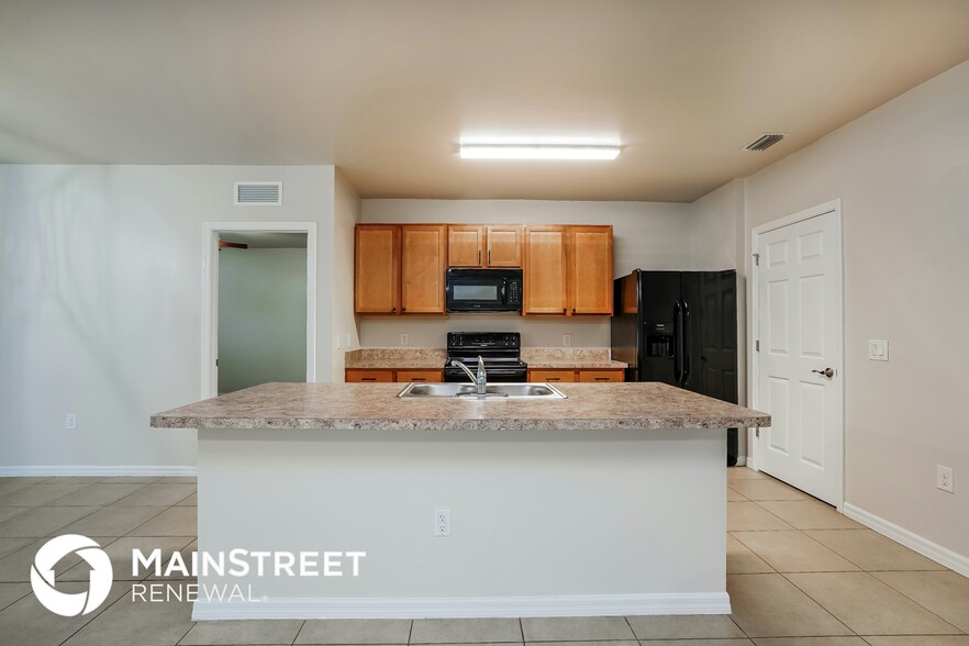 Building Photo - 3451 Acapulco Cir