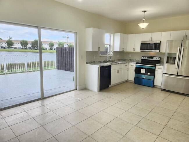 Building Photo - Southeast 31st Court, Homestead, FL 33035 - 3 BR 2.5 BA townhouse