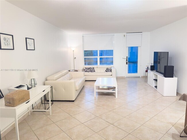 Building Photo - 10185 Collins Ave