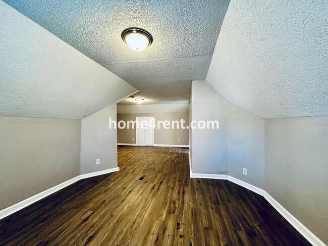 Building Photo - Adorable Home Featuring Wood Floors, SS Ap...