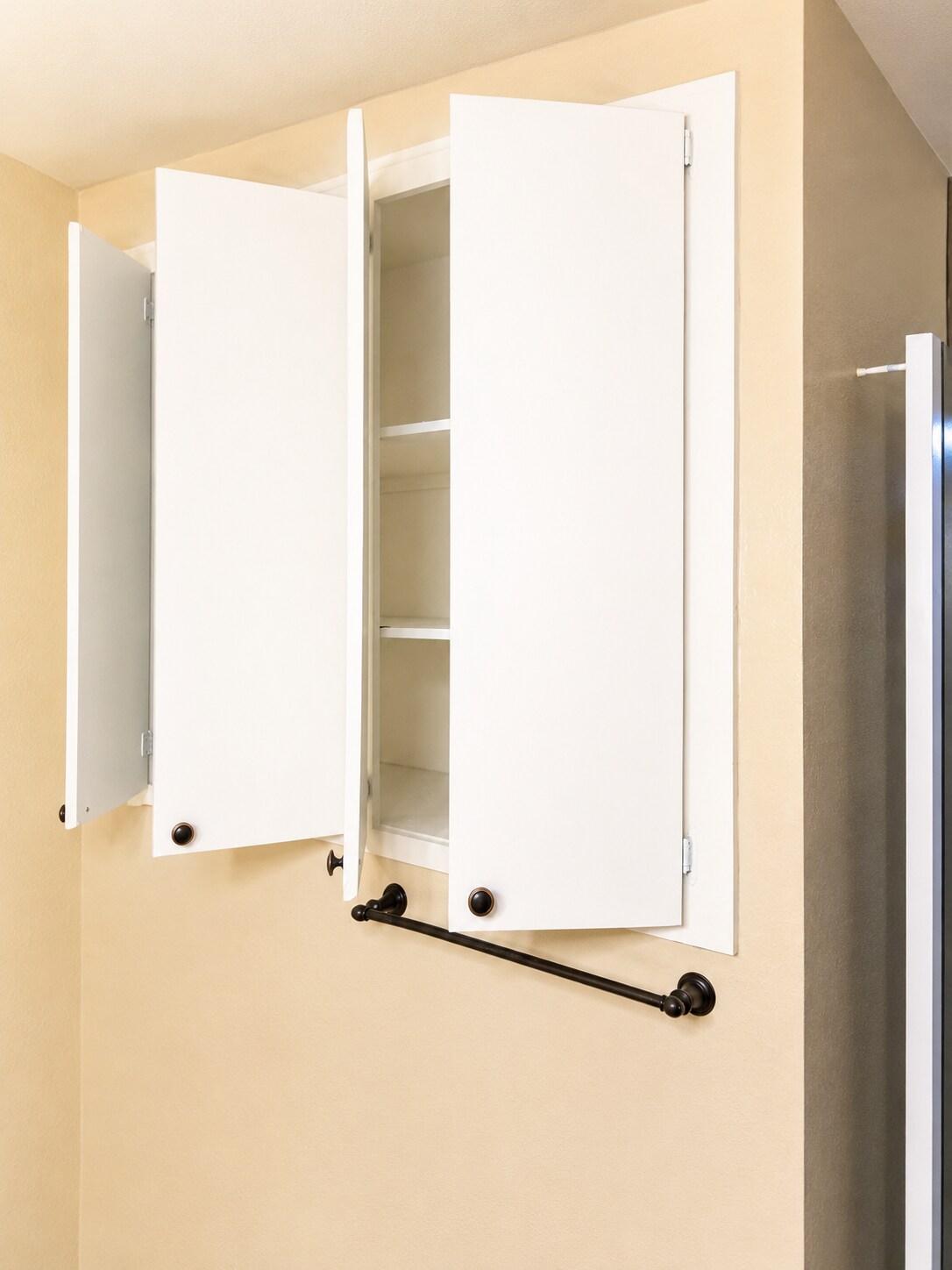 Bathroom includes built-in medicine cabinet and storage for added convenience. - 339 E Taft Ave