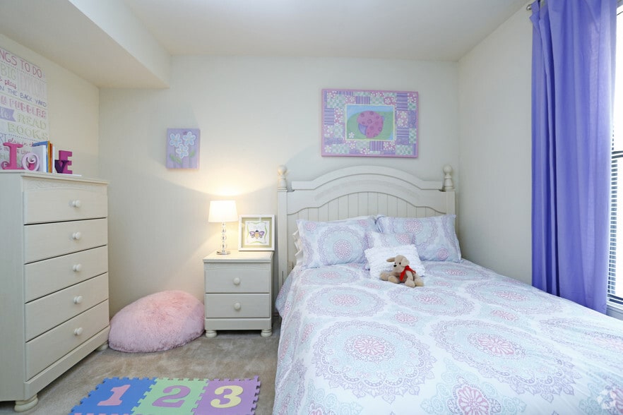 2BR, 1.5BA - 828sf Cedar- Bedroom - Woodlake Downs