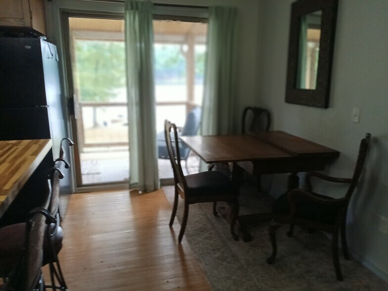 Dining area with double slider lake view - 83 Monongahela Dr