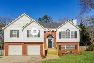 Building Photo - 4 Bedroom Pet-Friendly Home in Powder Springs, GA with Main Street Renewal