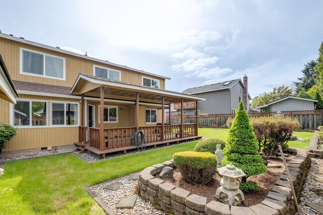 Building Photo - Spacious 5-Bedroom Home with Beautiful Bac...