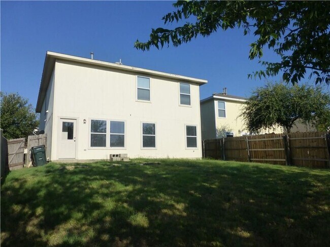 Building Photo - Generous Four Bedroom, Three Bath Home with Large Yard