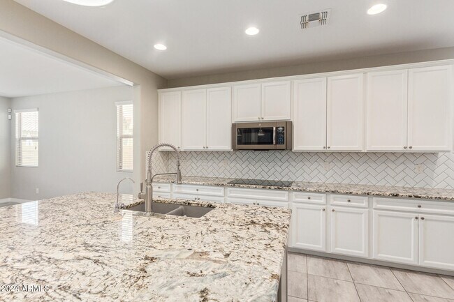 Building Photo - 21366 W Almeria Rd