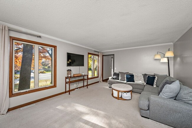 Building Photo - Stunning Remodeled 4BR Home w/ Pond View & 3-Seasons Porch!