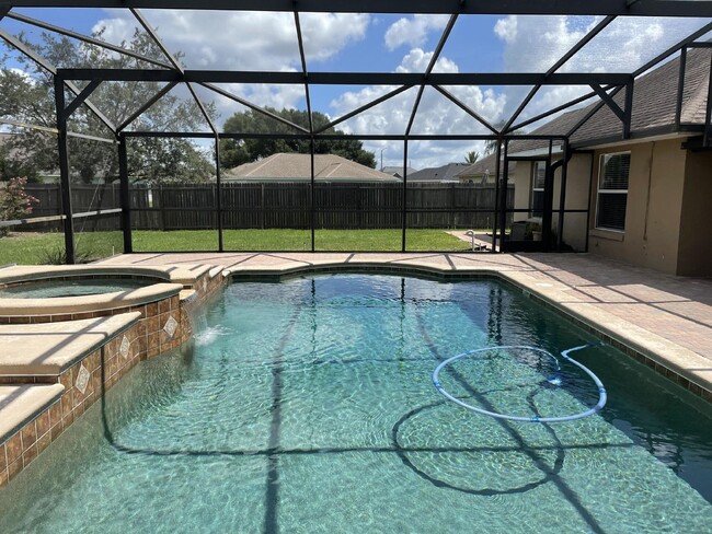 Building Photo - Beautiful 3 Bedroom 2 Bath Pool Home Lawn ...