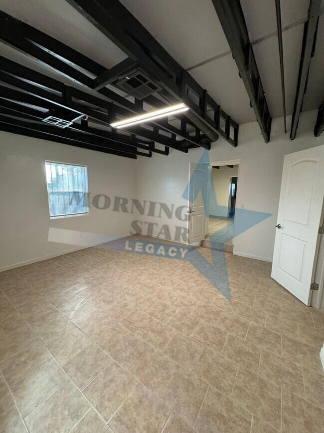 Building Photo - Charming Updated Home w/ Enclosed Yard & Storage