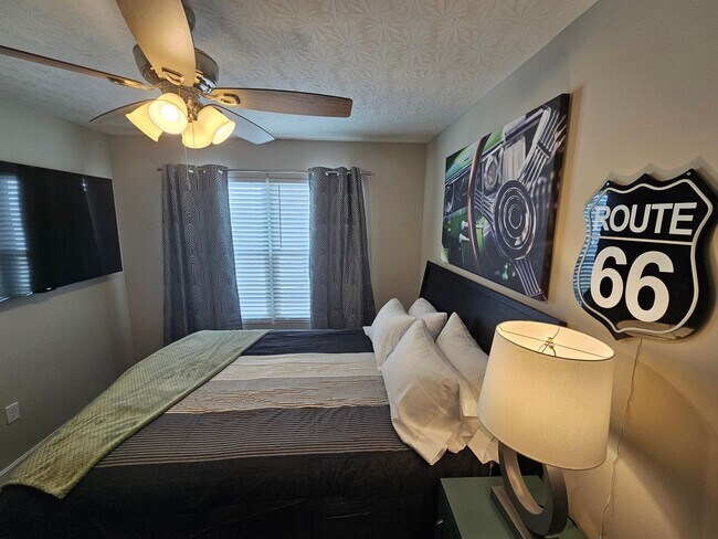 Building Photo - Vroooom . . . . the ROAD is calling. . . .Fully furnished themed rental includes all utilities an...