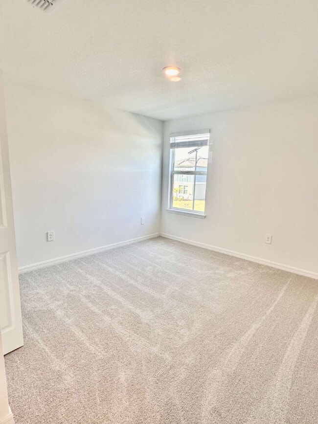 Building Photo - 8406 Blue Wave Ln E