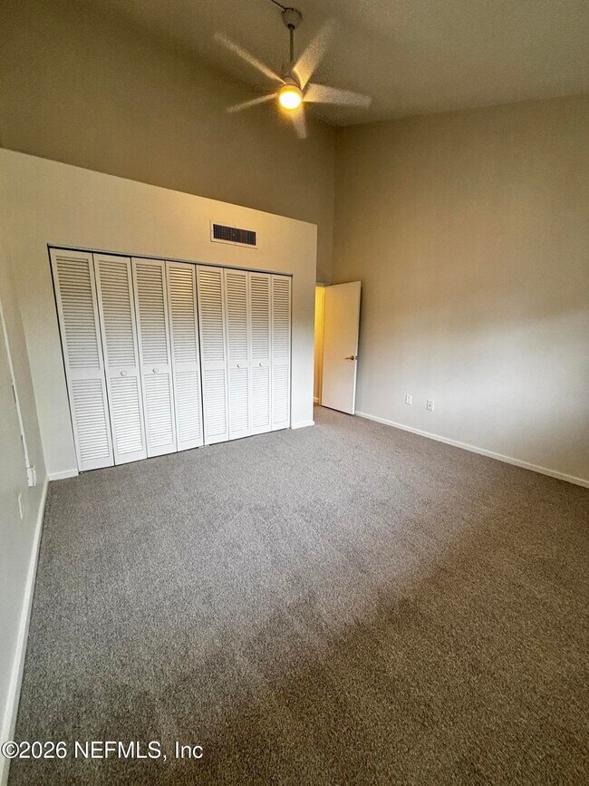 Building Photo - 9787 Sawgrass Dr E