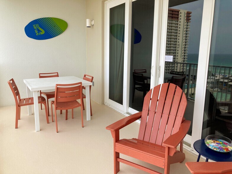 Enjoy a cup of coffee on the balcony - 9860 S Thomas Dr