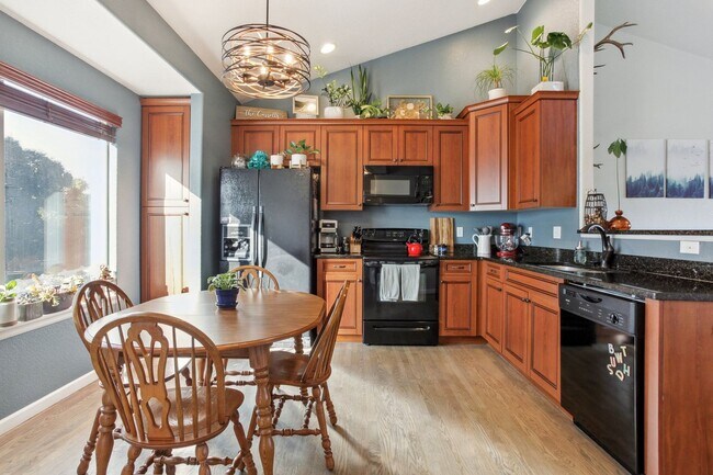 Building Photo - Arvada Townhome with Serene Lake Views