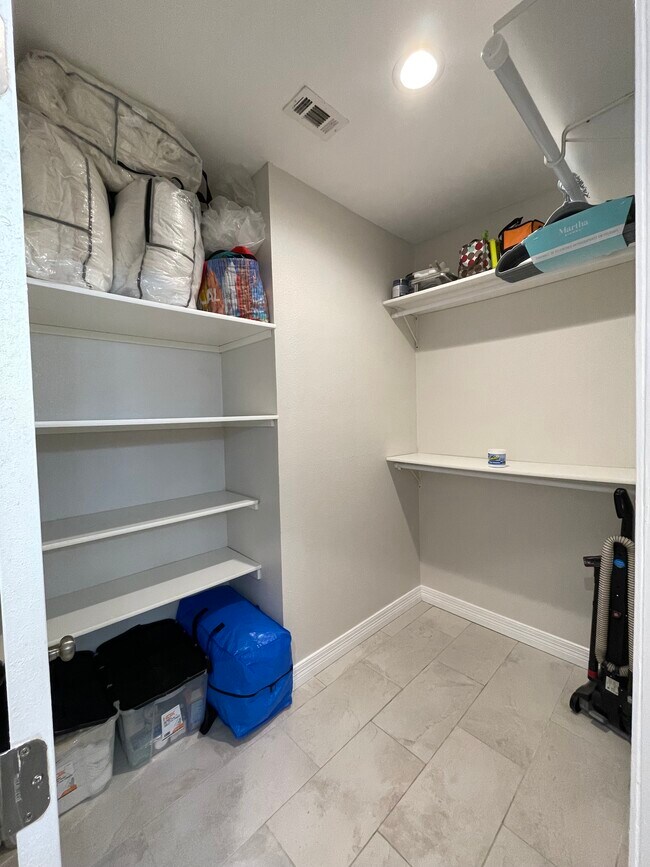 Other section of the walk-in closet - 5550 Spring Valley Rd