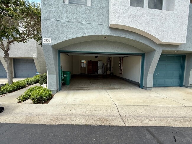 Building Photo - Spacious 3 Bedroom 2.5 Bath Townhouse with Private Garden Patio & a Community Pool/Spa! Attached ...