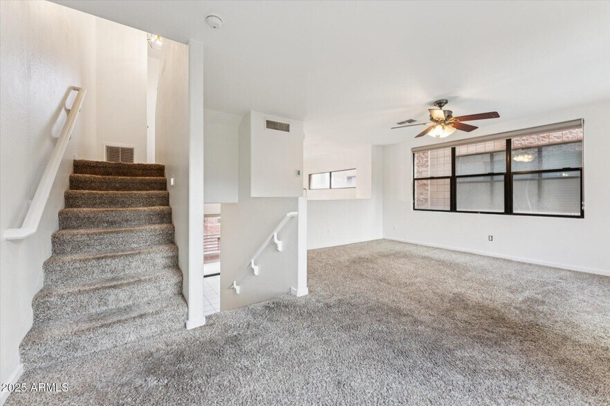 family room (steps down to kitchen, steps up to bedrooms) - 330 S Farmer Ave