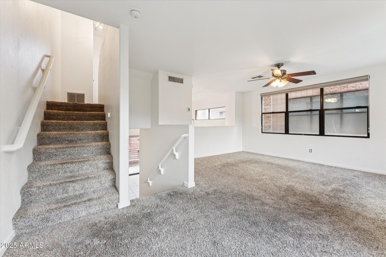 family room (steps down to kitchen, steps up to bedrooms) - 330 S Farmer Ave