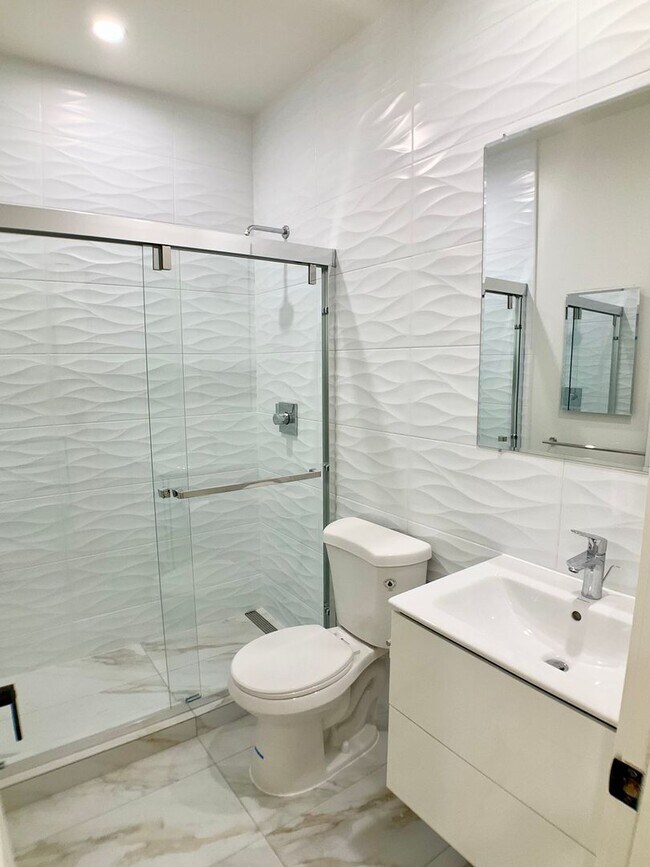 Building Photo - FULLY Remodeled. BRIGHT! In-Unit W/D, Stainless Appliance Package, MODERN!