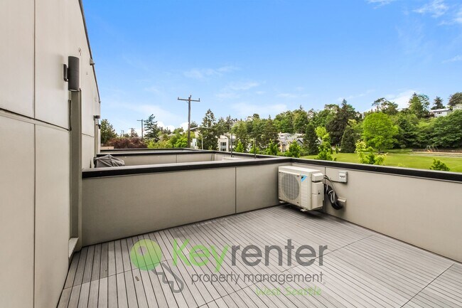 Building Photo - Modern 3 Bedroom with Rooftop Deck and In Unit Laundry
