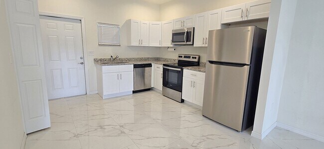 Building Photo - Brand-New Modern 2BR/1BA Home – Desirable Lehigh Location